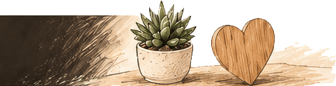 Potted succulent beside wooden heart decoration
